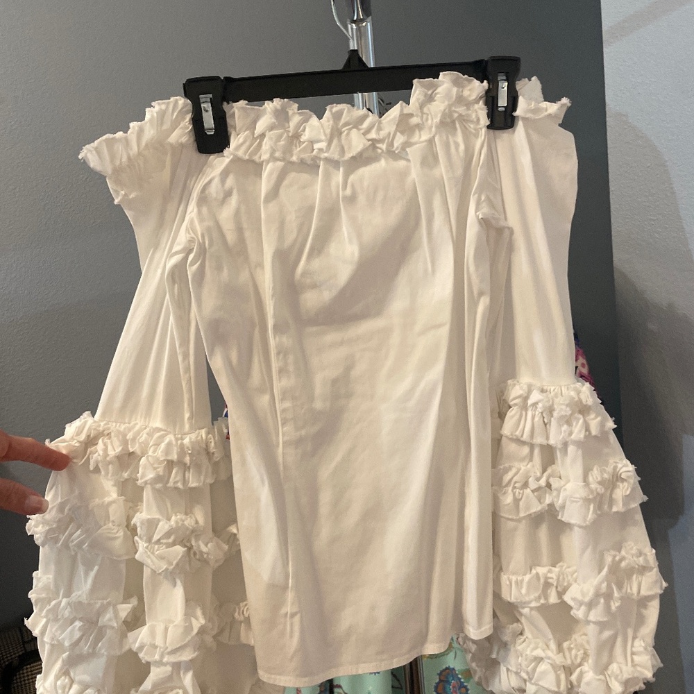 Caroline Constance cold shoulder, white ruffle